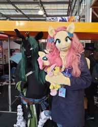 Size: 1572x2048 | Tagged: safe, fluttershy, queen chrysalis, hearth's warming con, g4, fursuit, irl, netherlands, photo