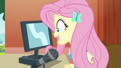 Size: 1280x720 | Tagged: safe, screencap, fluttershy, equestria girls, equestria girls series, fluttershy's butterflies, g4, computer, cute, fluttershy's butterflies: rainbow dash, geode of fauna, hairpin, jewelry, magical geodes, microphone, necklace, open mouth, shyabetes, smiling