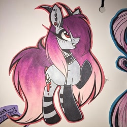 Size: 1080x1080 | Tagged: safe, artist:moshi.poni, oc, oc only, pony, choker, clothes, ear fluff, ear piercing, female, grin, horns, looking up, mare, piercing, signature, smiling, socks, solo, traditional art