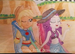 Size: 1080x786 | Tagged: safe, artist:mmy_little_drawings, applejack, rarity, equestria girls, g4, my little pony equestria girls: better together, arm behind head, beach, clothes, cute, eyes closed, female, hat, holding hands, jackabetes, lesbian, one eye closed, outdoors, raribetes, ship:rarijack, shipping, sitting, sun hat, swimsuit, traditional art, watermark, wink