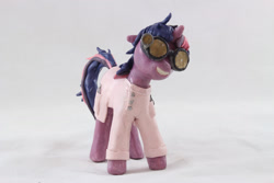 Size: 1280x854 | Tagged: safe, artist:azgchip, twilight sparkle, pony, unicorn, g4, clothes, craft, female, goggles, grin, head tilt, howie lab coat, lab coat, mare, messy mane, photo, scientist, sculpture, smiling, solo, standing, unicorn twilight, wax