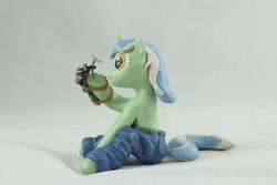 Size: 1280x854 | Tagged: safe, artist:azgchip, lyra heartstrings, pony, unicorn, g4, background pony, clothes, craft, female, flower, hand, jeans, mare, mechanical hands, pants, photo, sculpture, sitting, solo, that pony sure does love hands, that pony sure does love humans, wax