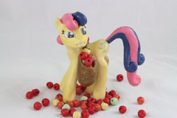 Size: 1280x854 | Tagged: safe, artist:azgchip, bon bon, sweetie drops, earth pony, pony, g4, apple, bag, craft, disgusted, female, food, i didn't put those in my bag, mare, meme, photo, saddle bag, sculpture, standing, upset, wax