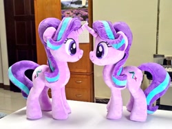 Size: 1024x768 | Tagged: safe, artist:nekokevin, starlight glimmer, pony, unicorn, series:nekokevin's glimmy, g4, duality, duo, female, irl, looking at each other, mare, photo, plushie, self ponidox, similo duplexis, size difference, smiling, table