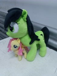 Size: 3120x4160 | Tagged: safe, artist:onlyfactory, fluttershy, oc, oc:filly anon, earth pony, pegasus, pony, g4, bootleg, female, filly, irl, photo, plushie, size difference