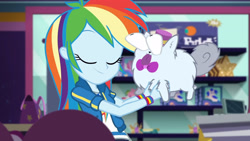 Size: 3410x1920 | Tagged: safe, screencap, rainbow dash, dashing through the mall, equestria girls, equestria girls specials, g4, my little pony equestria girls: better together, my little pony equestria girls: holidays unwrapped, clothes, cutie mark, cutie mark on clothes, eyes closed, female, geode of super speed, hoodie, jewelry, magical geodes, necklace, smiling, solo