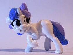 Size: 1600x1200 | Tagged: safe, artist:pessimizer, sweetie belle, pony, unicorn, g4, 3d print, female, figurine, filly, irl, looking back, photo, raised hoof, solo