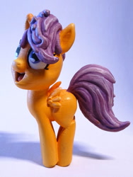 Size: 1125x1500 | Tagged: safe, artist:pessimizer, scootaloo, pegasus, pony, g4, 3d print, cute, cutealoo, female, figurine, filly, happy, irl, jumping, photo, smiling, solo