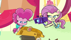 Size: 1920x1080 | Tagged: safe, screencap, fluttershy, pinkie pie, earth pony, pegasus, pony, g4.5, my little pony: pony life, the crystal capturing contraption, spoiler:pony life s02e02, camera, female, mare