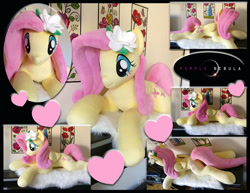 Size: 1280x990 | Tagged: safe, artist:purplenebulastudios, fluttershy, pegasus, pony, g4, cute, female, flower, flower in hair, heart, irl, life size, lying down, mare, photo, plushie, pretty, prone, shyabetes, solo
