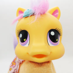 Size: 886x886 | Tagged: safe, scootaloo (g3), earth pony, pony, g3, baby, baby pony, bow, cute, diaper, duckface, electronic toy, female, filly, foal, g3 cutealoo, hair bow, heart, heart eyes, irl, nightmare fuel, photo, so soft, so soft crawling scootaloo, solo, toy, wingding eyes