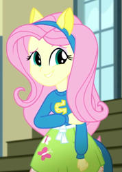 Size: 445x624 | Tagged: safe, screencap, fluttershy, equestria girls, g4, my little pony equestria girls: summertime shorts, steps of pep, breasts, bust, canterlot high, clothes, collar, cropped, eyebrows, eyeshadow, fake ears, fake tail, female, grin, gym, hand on arm, holding arm, makeup, raised eyebrow, school, skirt, smiling, solo, standing, sweater, teenager, teeth