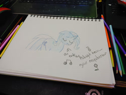 Size: 1280x960 | Tagged: safe, artist:dougtheloremaster, part of a set, trixie, pony, unicorn, g4, don't stop believing, eyes closed, journey (band), part of a series, pencil, pencil drawing, photo, singing, sketchpad, song reference, traditional art