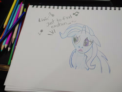 Size: 1280x960 | Tagged: safe, artist:dougtheloremaster, part of a set, trixie, pony, unicorn, g4, don't stop believing, floppy ears, journey (band), part of a series, pencil, pencil drawing, photo, sad, singing, sketchpad, song reference, traditional art
