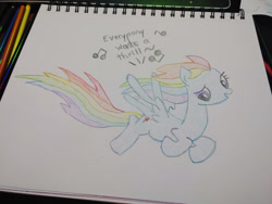 Size: 1280x960 | Tagged: safe, artist:dougtheloremaster, part of a set, rainbow dash, pegasus, pony, g4, don't stop believing, flying, journey (band), looking down, part of a series, pencil, pencil drawing, photo, singing, sketchpad, solo, song reference, traditional art, windswept mane