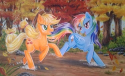 Size: 2425x1473 | Tagged: safe, artist:rainwaterfallszone, applejack, rainbow dash, earth pony, pegasus, pony, fall weather friends, g4, applejack's hat, autumn, colored pencil drawing, complex background, cowboy hat, day, dirt, dirt road, falling leaves, female, folded wings, foliage, freckles, grass, hat, leaves, looking at each other, looking back, mare, multicolored mane, open mouth, outdoors, painting, plant, raised hoof, rock, running, running of the leaves, scenery, scenery porn, shadow, shiny mane, smiling, stetson, traditional art, tree, watercolor painting, windswept mane, wings
