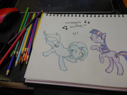 Size: 1280x960 | Tagged: safe, artist:dougtheloremaster, part of a set, trixie, twilight sparkle, pony, unicorn, g4, dancing, don't stop believing, eyes closed, female, journey (band), lesbian, part of a series, pencil, pencil drawing, photo, ship:twixie, shipping, sketchpad, song reference, traditional art, unicorn twilight