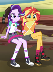 Size: 1024x1376 | Tagged: safe, artist:emeraldblast63, starlight glimmer, sunset shimmer, human, equestria girls, g4, my little pony equestria girls: legend of everfree, bench, boots, camp everfree outfits, clothes, converse, crossed legs, cyoa, denim shorts, duo, duo female, female, grass, happy, kite, outdoors, purple eyes, purple skin, raccoon hat, shirt, shoes, shorts, sitting, smiling, sneakers, t-shirt, turquoise eyes, two toned hair, watch, water, wristwatch, yellow skin