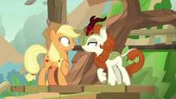 Size: 1920x1080 | Tagged: safe, screencap, applejack, autumn blaze, earth pony, kirin, pony, g4, season 8, sounds of silence, applejack's hat, cowboy hat, duo, duo female, eyelashes, female, frown, hat, lidded eyes, looking at each other, mare, raised hoof, shrunken pupils, smiling, teeth