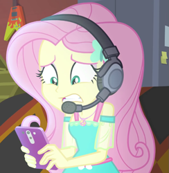 Size: 717x734 | Tagged: safe, screencap, fluttershy, costume conundrum, equestria girls, g4, my little pony equestria girls: better together, cellphone, cropped, gritted teeth, headphones, headset, phone, solo