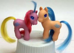 Size: 800x570 | Tagged: safe, photographer:relcestia, coral (g2), ocean (g2), earth pony, pony, g2, colt, female, filly, fraternal twins, male, photo, siblings, smiling, toy, twin baby ponies, twins