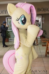 Size: 640x960 | Tagged: safe, artist:pupanicorn, fluttershy, human, g4, clothes, convention, cosplay, costume, fursuit, irl, irl human, photo, ponysuit