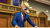 Size: 3840x2160 | Tagged: safe, alternate version, artist:antonsfms, oc, oc only, oc:nickyequeen, donkey, anthro, 3d, ace attorney, alternate universe, angry, anthro oc, badge, banner, clothes, commission, commissioner:nickyequeen, court, courtroom, crossover, desk, donkey oc, formal attire, formal wear, hand on hip, high res, image set, leaning, looking up, male, phoenix wright, solo, source filmmaker, suit