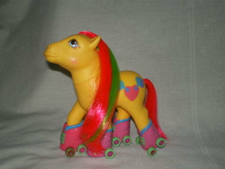 Size: 640x480 | Tagged: safe, photographer:lancer, jazzie, earth pony, pony, g1, female, irl, mare, photo, roller skates, rollerskate ponies, toy, walking