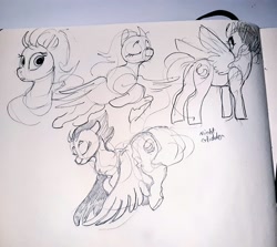 Size: 1024x912 | Tagged: safe, artist:alumx, night glider, pegasus, pony, g4, butt, eyes closed, female, flying, mare, monochrome, pencil drawing, photo, plot, sketch, solo, traditional art