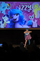 Size: 4149x6223 | Tagged: safe, izzy moonbow, human, g5, 2021, clothes, convention, cosplay, costume, cyrillic, irl, irl human, newbronycon, photo, rubronycon, russian