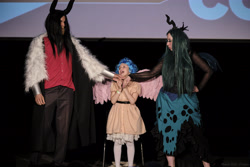 Size: 6056x4037 | Tagged: safe, cozy glow, lord tirek, queen chrysalis, human, g4, 2021, clothes, cosplay, costume, cyrillic, female, filly, horn, irl, irl human, legion of doom, newbronycon, photo, play, rubronycon, russian, skit, stage, thinking, trio