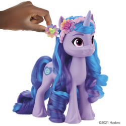 Size: 2000x2000 | Tagged: safe, izzy moonbow, human, pony, unicorn, g5, official, accessory, brushable, female, flower, flower in hair, headband, high res, irl, irl human, mare, photo, toy, unicorn charms izzy moonbow