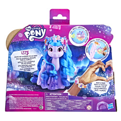 Size: 2000x2000 | Tagged: safe, izzy moonbow, pony, unicorn, g5, official, bridlewood, brushable, female, flower, flower in hair, hasbro logo, headband, high res, irl, mare, merchandise, my little pony logo, packaging, photo, toy, unicorn charms izzy moonbow