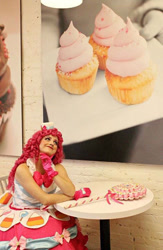 Size: 470x720 | Tagged: safe, artist:sarahndipity cosplay, pinkie pie, human, g4, the best night ever, 2016, clothes, cosplay, costume, cupcake, dress, food, gala dress, irl, irl human, looking up, photo, poster, sitting