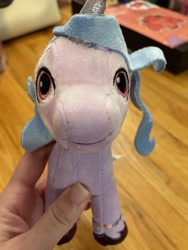 Size: 3024x4032 | Tagged: safe, photographer:errant_harpy, izzy moonbow, pony, unicorn, g5, my little pony: a new generation, female, irl, looking at you, mare, photo, plushie, toy