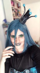 Size: 536x960 | Tagged: safe, artist:sarahndipity cosplay, queen chrysalis, human, g4, clothes, cosplay, costume, facebook, fangs, irl, irl human, long nails, open mouth, photo