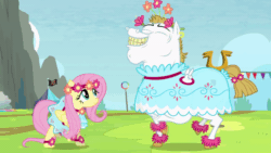 Size: 800x450 | Tagged: safe, screencap, bulk biceps, fluttershy, pegasus, pony, g4, rainbow falls, animated, clothes, crossdressing, cute, dancing, dress, female, floral head wreath, flower, fluttershy likes femboys, male, mare, prancing, stallion, trotting, trotting in place