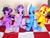 Size: 1024x768 | Tagged: safe, artist:nekokevin, starlight glimmer, sunset shimmer, trixie, twilight sparkle, pony, unicorn, g4, female, frog (hoof), irl, looking at you, magical quartet, mare, open mouth, photo, picnic blanket, plushie, raised hoof, sitting, smiling, underhoof, unicorn twilight