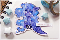 Size: 1024x683 | Tagged: safe, artist:aniimoni, princess luna, alicorn, pony, g4, bust, chest fluff, colored pupils, crying, cute, cutout, ear fluff, lunabetes, origami, photo, solo, stars, traditional art, watercolor painting