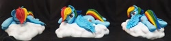 Size: 2277x552 | Tagged: safe, artist:vita96, rainbow dash, pegasus, pony, g4, cloud, craft, female, frog (hoof), irl, looking at you, lying down, mare, on a cloud, one eye closed, photo, polymer clay, prone, sculpture, solo, underhoof