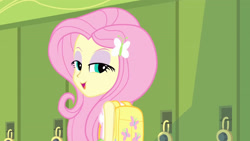 Size: 3410x1920 | Tagged: safe, screencap, fluttershy, equestria girls, g4, my little pony equestria girls, backpack, clothes, cute, cutie mark, cutie mark on clothes, female, lidded eyes, lockers, open mouth, shyabetes, smug