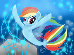 Size: 960x720 | Tagged: safe, artist:lightstar2001, rainbow dash, pegasus, pony, seapony (g4), g4, bioluminescent, crepuscular rays, deviantart watermark, eyelashes, female, fish tail, flowing tail, multicolored hair, obtrusive watermark, ocean, pink eyes, rock, seaponified, seapony rainbow dash, seaweed, signature, smiling, solo, species swap, swimming, tail, underwater, water, watermark