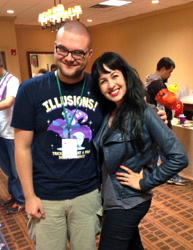 Size: 500x647 | Tagged: safe, trixie, human, g4, canterlot gardens convention, clothes, glasses, grey delisle, hand on hip, irl, irl human, photo, shirt, t-shirt, voice actor