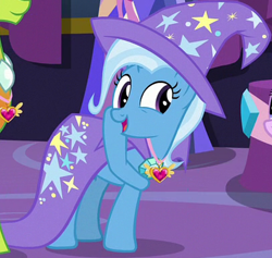 Size: 610x578 | Tagged: safe, screencap, starlight glimmer, thorax, trixie, changedling, changeling, pony, unicorn, celestial advice, g4, season 7, cape, clothes, cropped, equestrian pink heart of courage, female, hat, king thorax, mare, offscreen character, solo focus, trixie's cape, trixie's hat