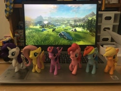 Size: 4032x3024 | Tagged: safe, applejack, fluttershy, pinkie pie, rainbow dash, rarity, twilight sparkle, alicorn, pony, g4, computer, desk, irl, laptop computer, mane six, photo, the legend of zelda, the legend of zelda: breath of the wild, toy, twilight sparkle (alicorn)