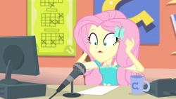 Size: 3410x1920 | Tagged: safe, screencap, fluttershy, equestria girls, fluttershy's butterflies, fluttershy's butterflies: rainbow dash, g4, my little pony equestria girls: better together, computer, female, geode of fauna, hairpin, jewelry, magical geodes, microphone, mug, necklace, open mouth, solo
