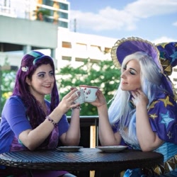 Size: 1021x1019 | Tagged: safe, artist:mieucosplay, artist:sarahndipity cosplay, artist:xen photography, starlight glimmer, trixie, human, g4, cape, clothes, cosplay, costume, cup, hat, irl, irl human, photo, teacup, trixie's cape, trixie's hat