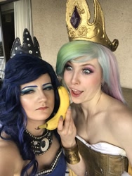 Size: 1538x2048 | Tagged: safe, artist:sarahndipity cosplay, princess celestia, princess luna, human, g4, banana, bare shoulders, clothes, cosplay, costume, do you like bananas?, everfree northwest, everfree northwest 2018, food, irl, irl human, luna is not amused, open mouth, photo, unamused