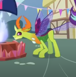Size: 396x400 | Tagged: safe, screencap, thorax, alicorn, changedling, changeling, pony, unicorn, g4, triple threat, behaving like a moth, blurry, bugs doing bug things, cropped, cute, female, fire, king thorax, male, offscreen character, smiling, solo focus, stare, thorabetes, twilight sparkle (alicorn)