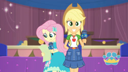 Size: 3410x1920 | Tagged: safe, screencap, applejack, fluttershy, best in show: the pre-show, equestria girls, g4, my little pony equestria girls: better together, applejack's hat, applejack's shirt with a collar, applejack's skirt, arm behind back, belt, best in show logo, clothes, collar, collar shirt, cowboy hat, cute, cutie mark, cutie mark on clothes, denim, denim skirt, dress, female, freckles, geode of fauna, geode of super strength, grin, hair, hat, holding, jackabetes, jewelry, legs together, lip bite, magical geodes, microphone, necklace, ponytail, shirt, shirt with a collar, shorts, skirt, smiling, t-shirt, teenager